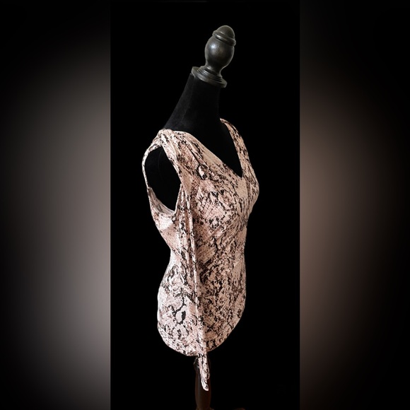 Jennifer Lopez: Brown and White Animal Print Cold Shoulder Blouse - Picture 6 of 17